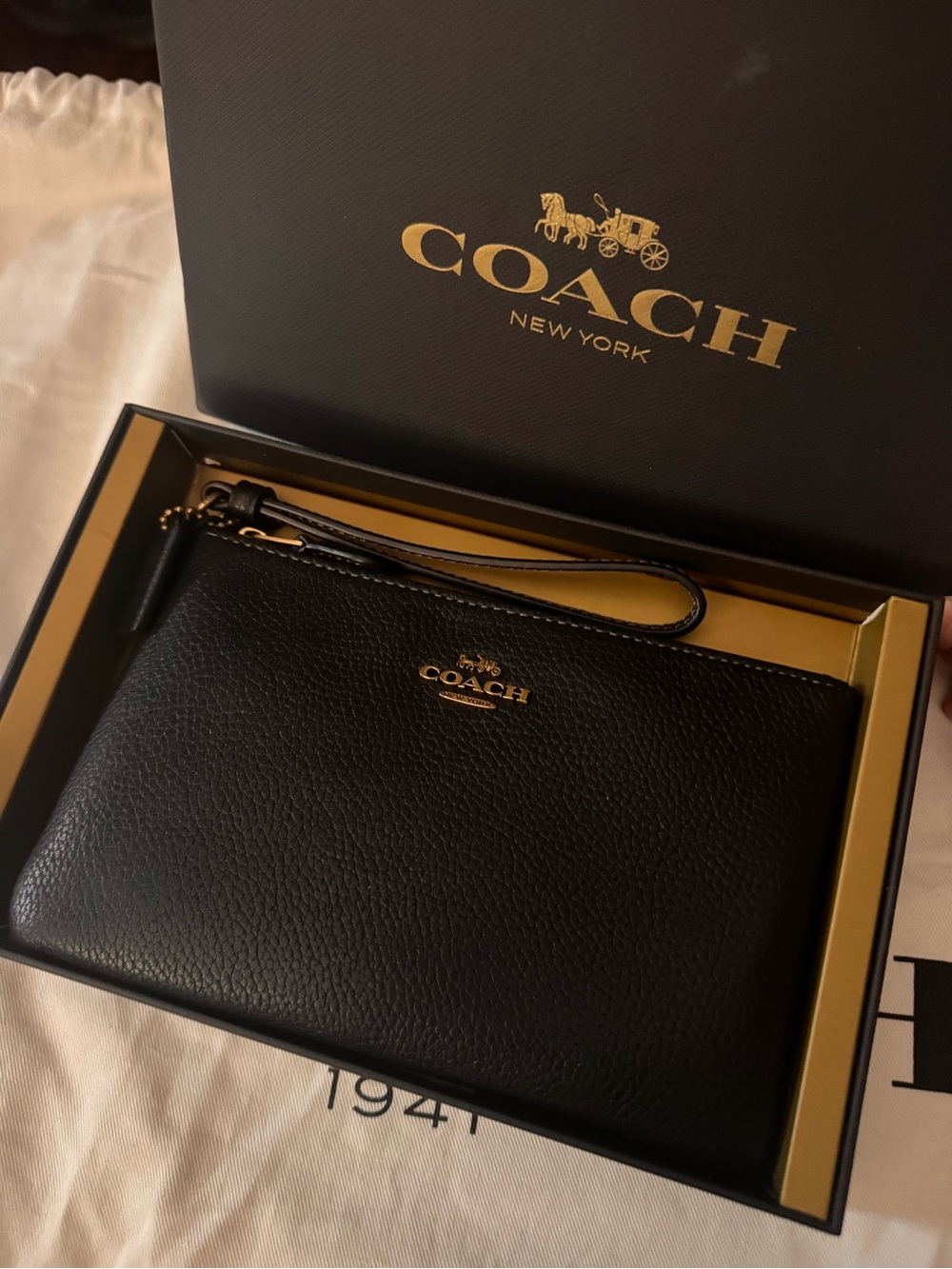 Coach Black Pebbled Leather Wristlet with Gold Logo